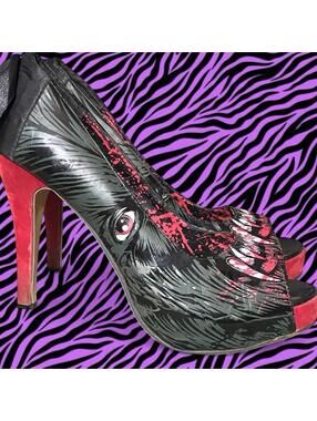 Iron Fist Wolf Beater peep toe platforms.